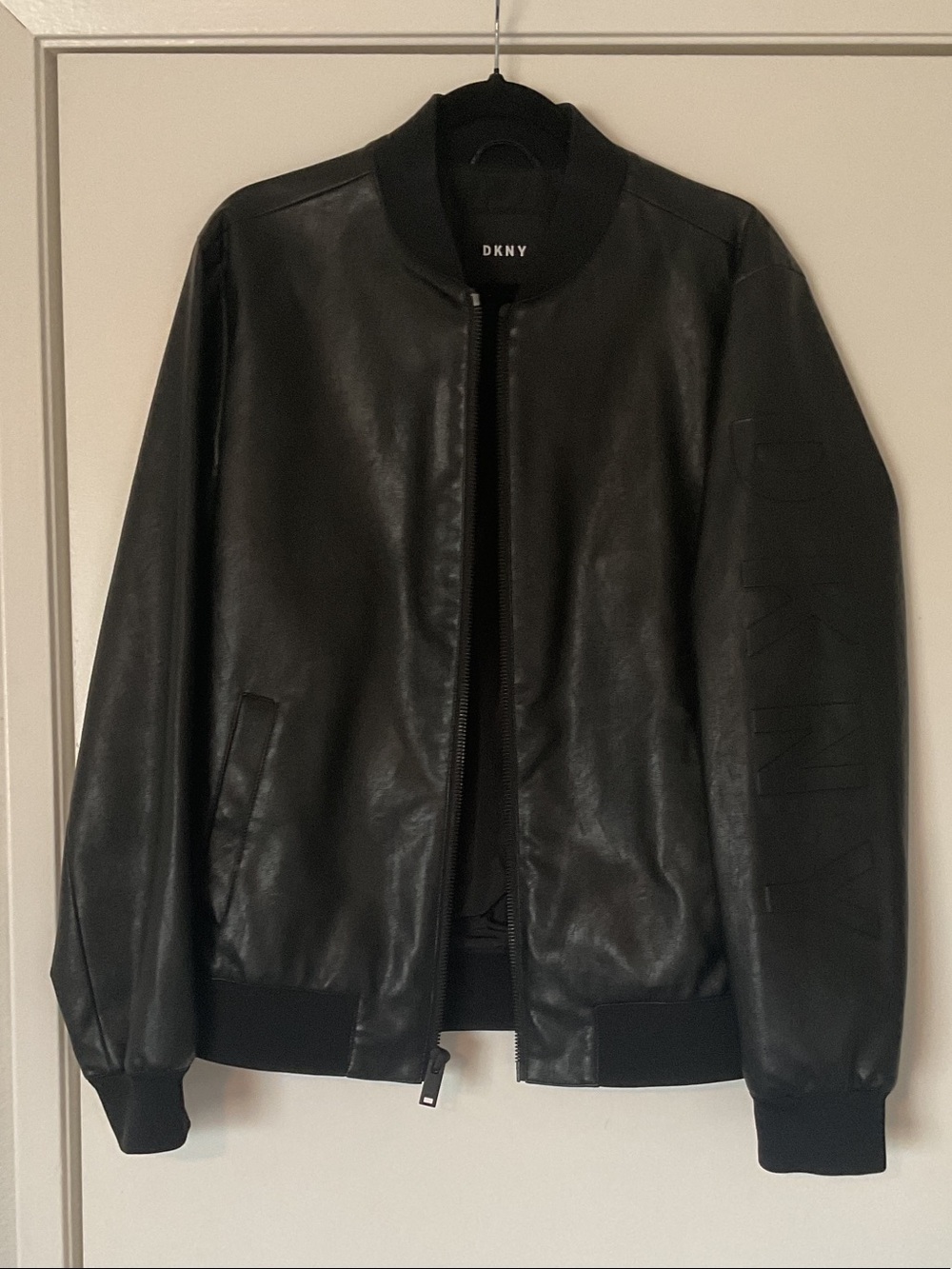 DKNY Black Leather Bomber Jacket with Subtle Sleeve Branding